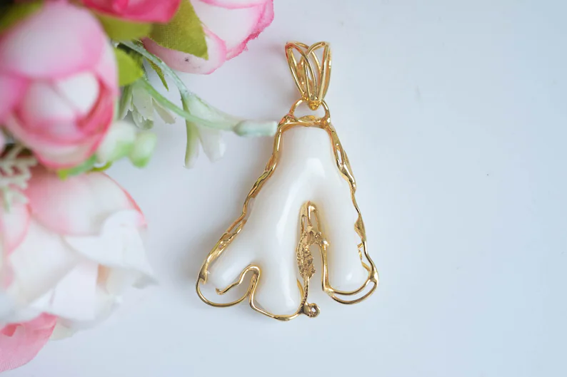 Pendant with natural pinkish white coral and 925 silver