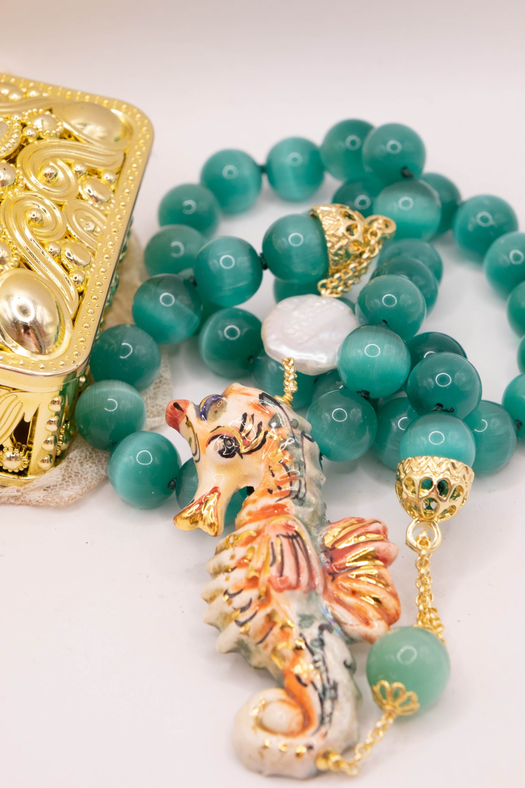 COLLANA CON CAVALLUCCIO MARINO CERAMICA SICILIANA DI CALTAGIRONE ARTIGIANALE OCCHIO DI GATTO VERDE (6)