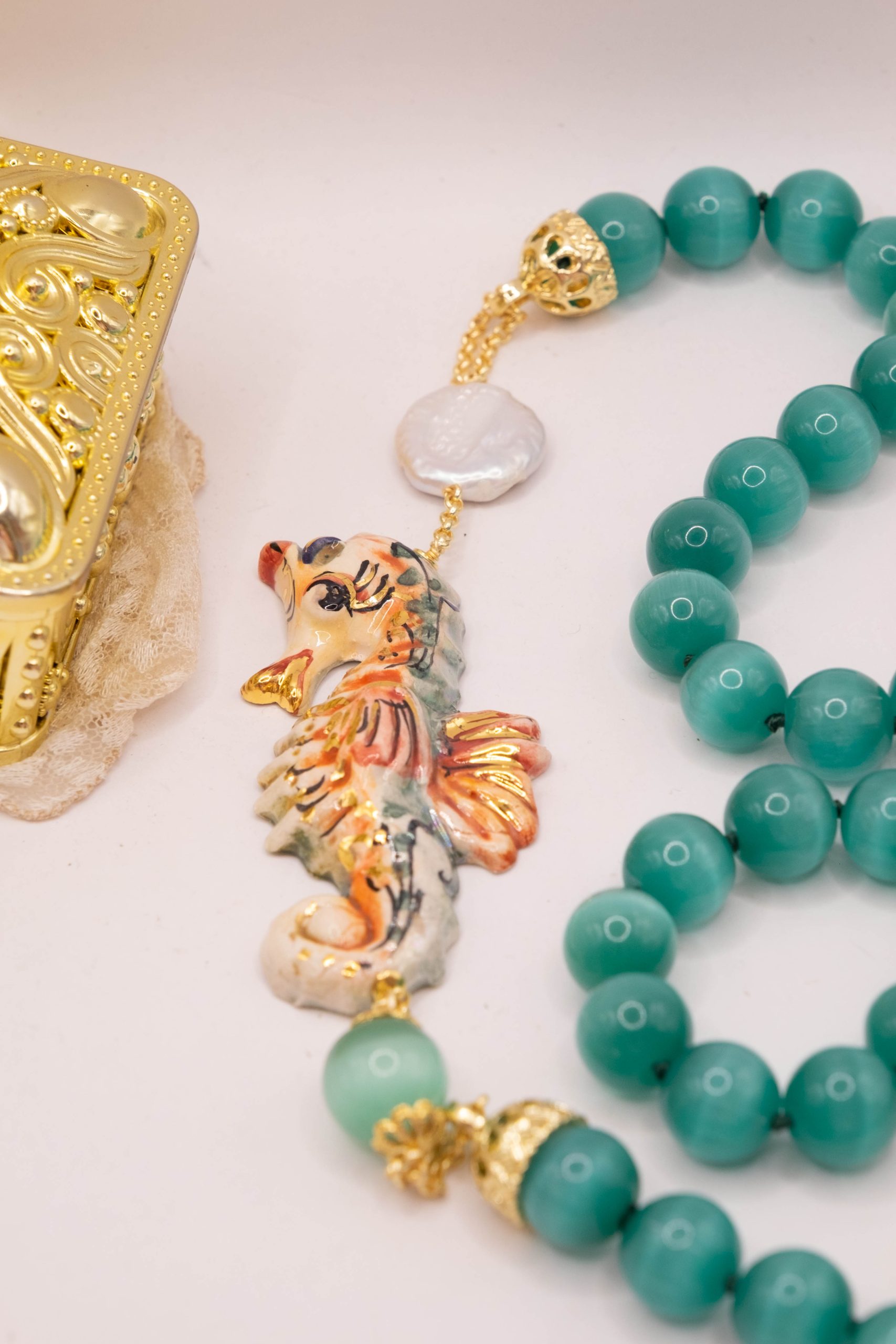 COLLANA CON CAVALLUCCIO MARINO CERAMICA SICILIANA DI CALTAGIRONE ARTIGIANALE OCCHIO DI GATTO VERDE (7)