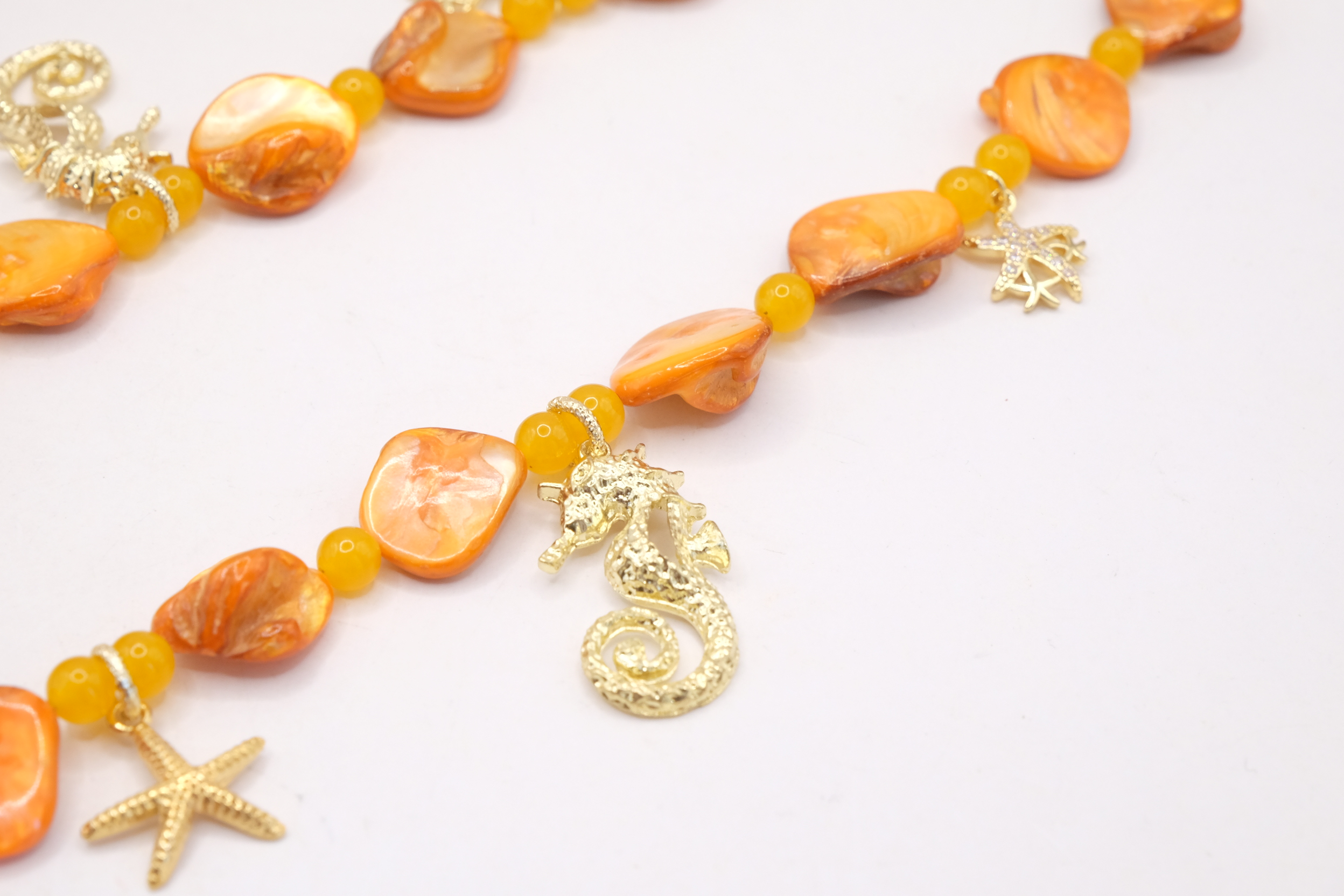COLLANA ARTIGIANALE MADREPERLA OCRA GIADA OCRA CONCHIGLIA STELLE CAVALLUCCIO (6)