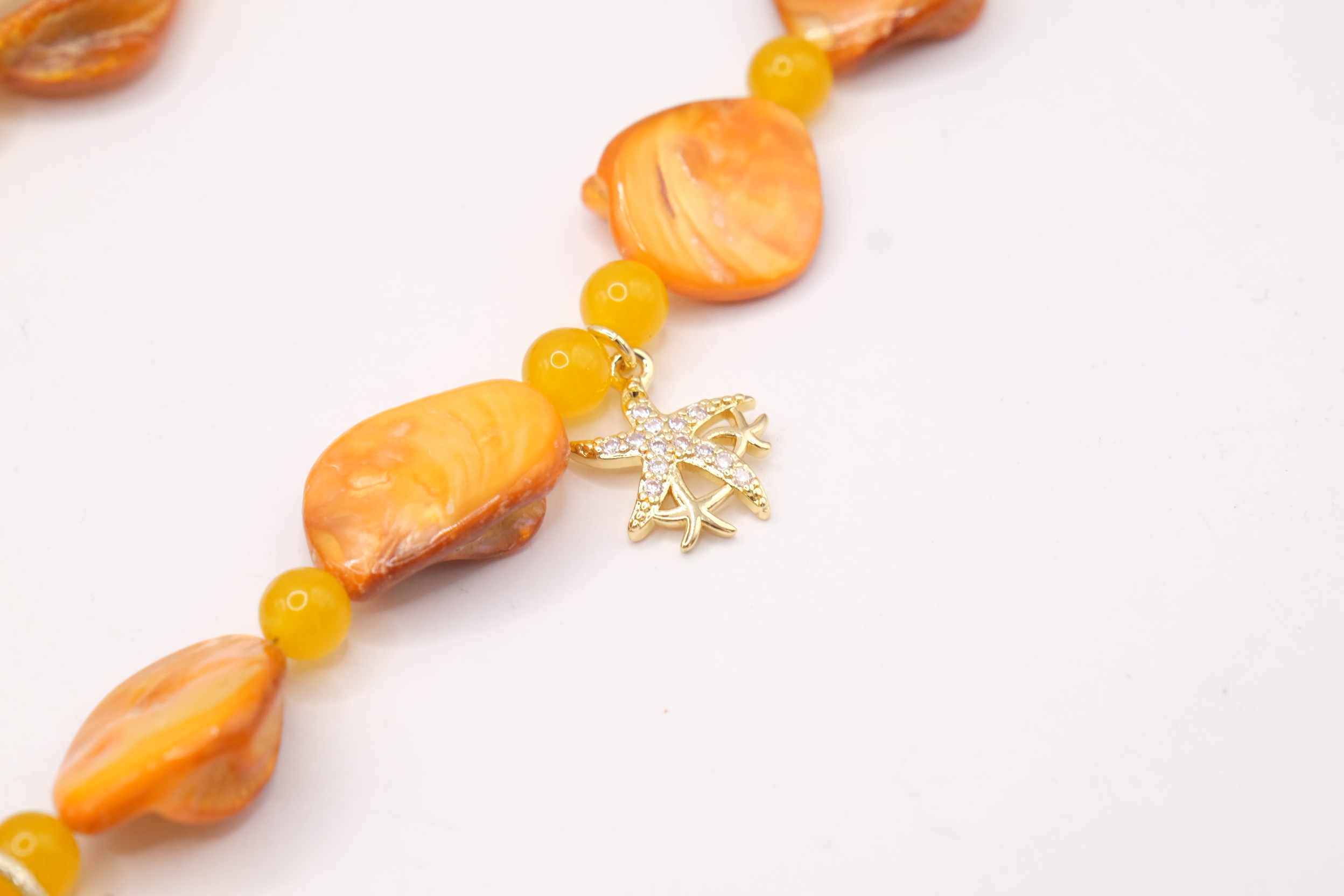 COLLANA ARTIGIANALE MADREPERLA OCRA GIADA OCRA CONCHIGLIA STELLE CAVALLUCCIO (7)