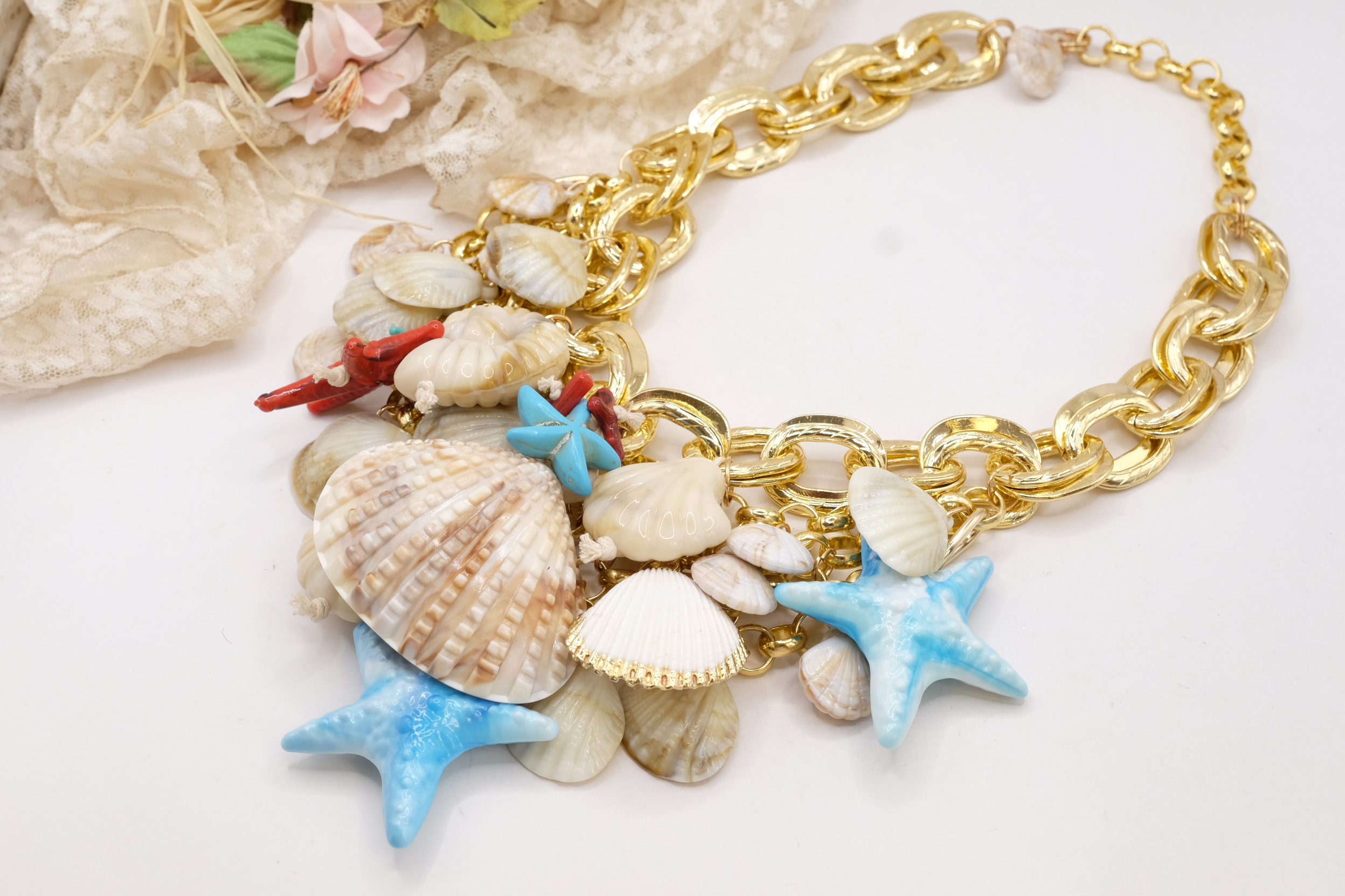 COLLANA MULTIFILO CONCHIGLIE E STELLE MARINE TURCHESE RESINA OTTONE (4)