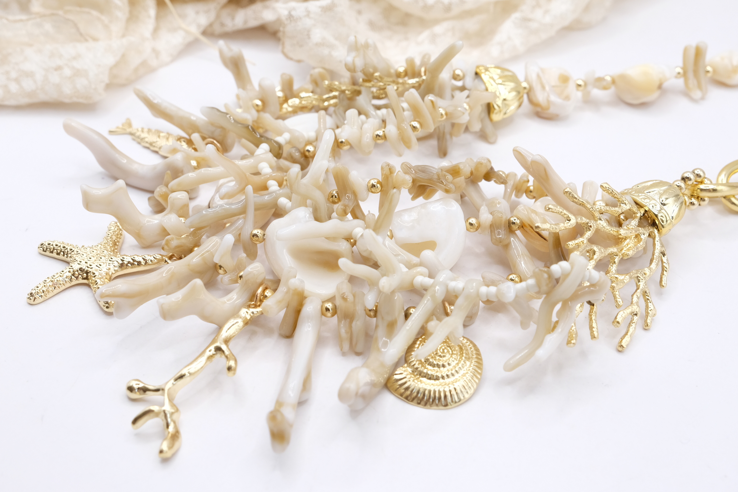 COLLANA MULTIFILO MADREPERLA STELLE MARINE OTTONE (6)