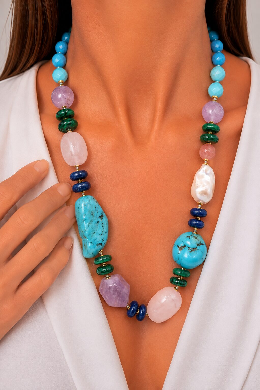 Handcrafted necklace with pearls, amethyst, turquoise, aquamarine, lapis, and malachite.